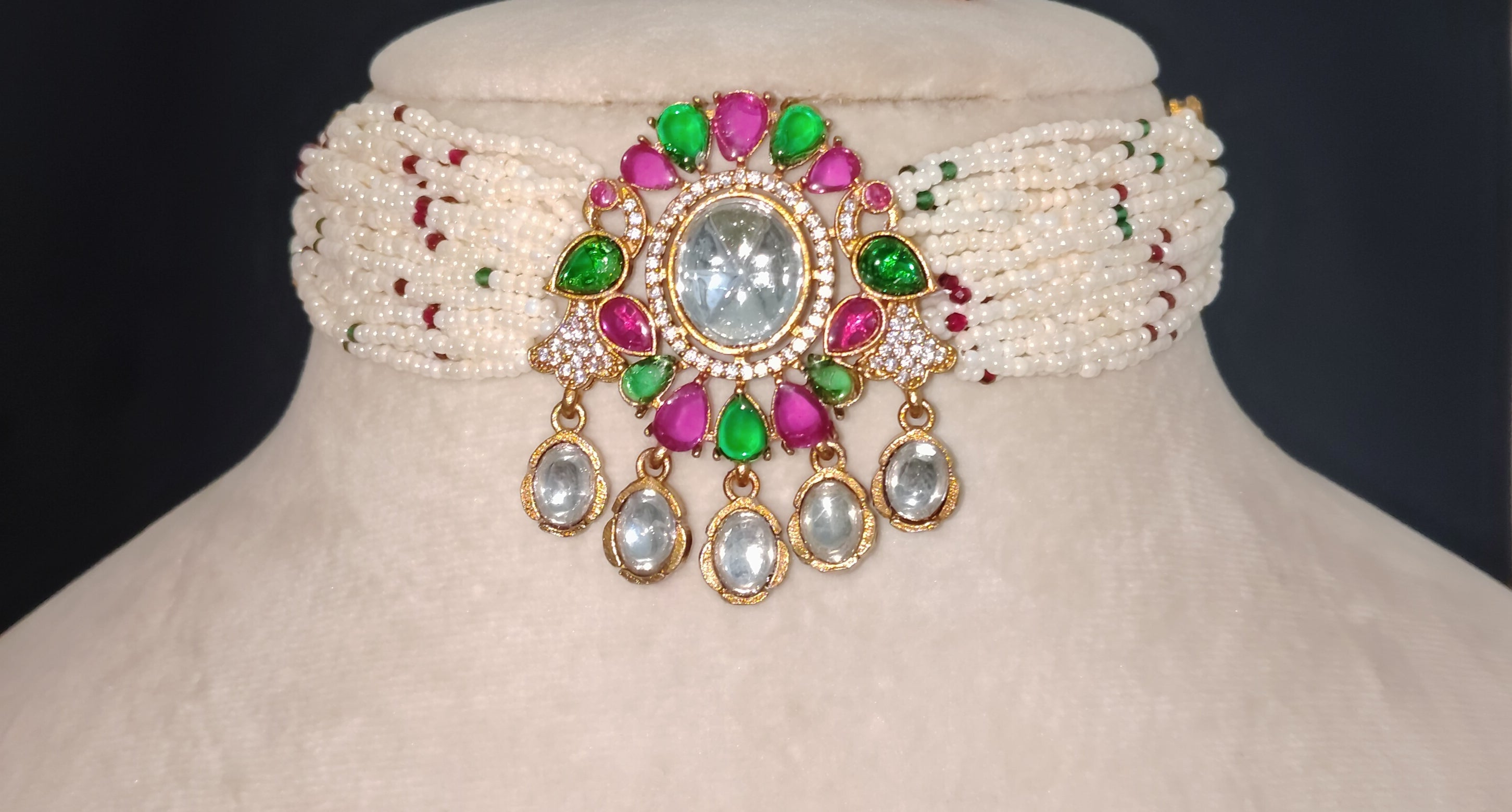 Dana Emerald Ruby Studded Multi Strand Pearl Kundan Choker Set Roz Jewellers.