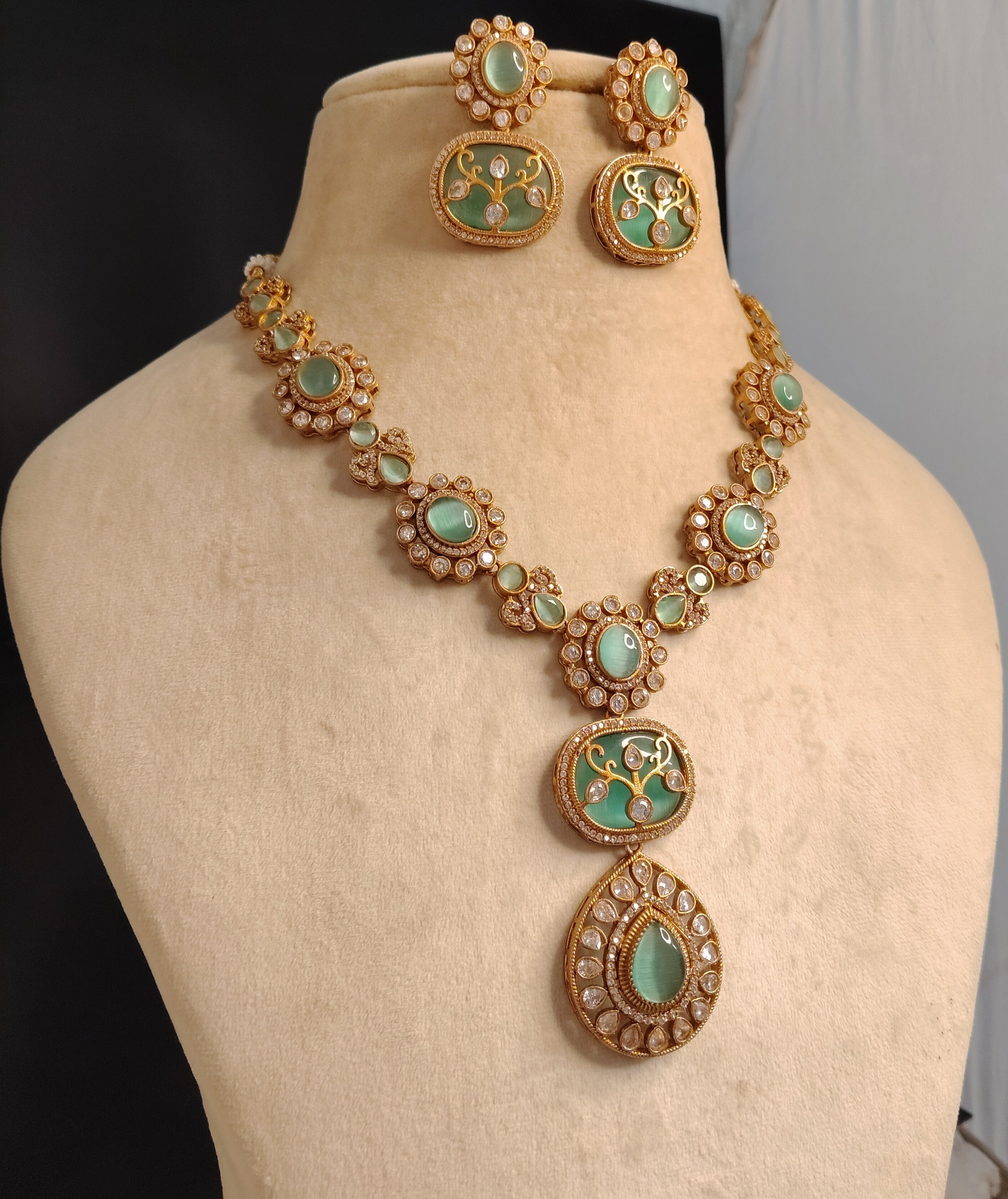Hadiya Indian Mint Green Stone Necklace Set with Antique Gold Finish Roz Jewellers.