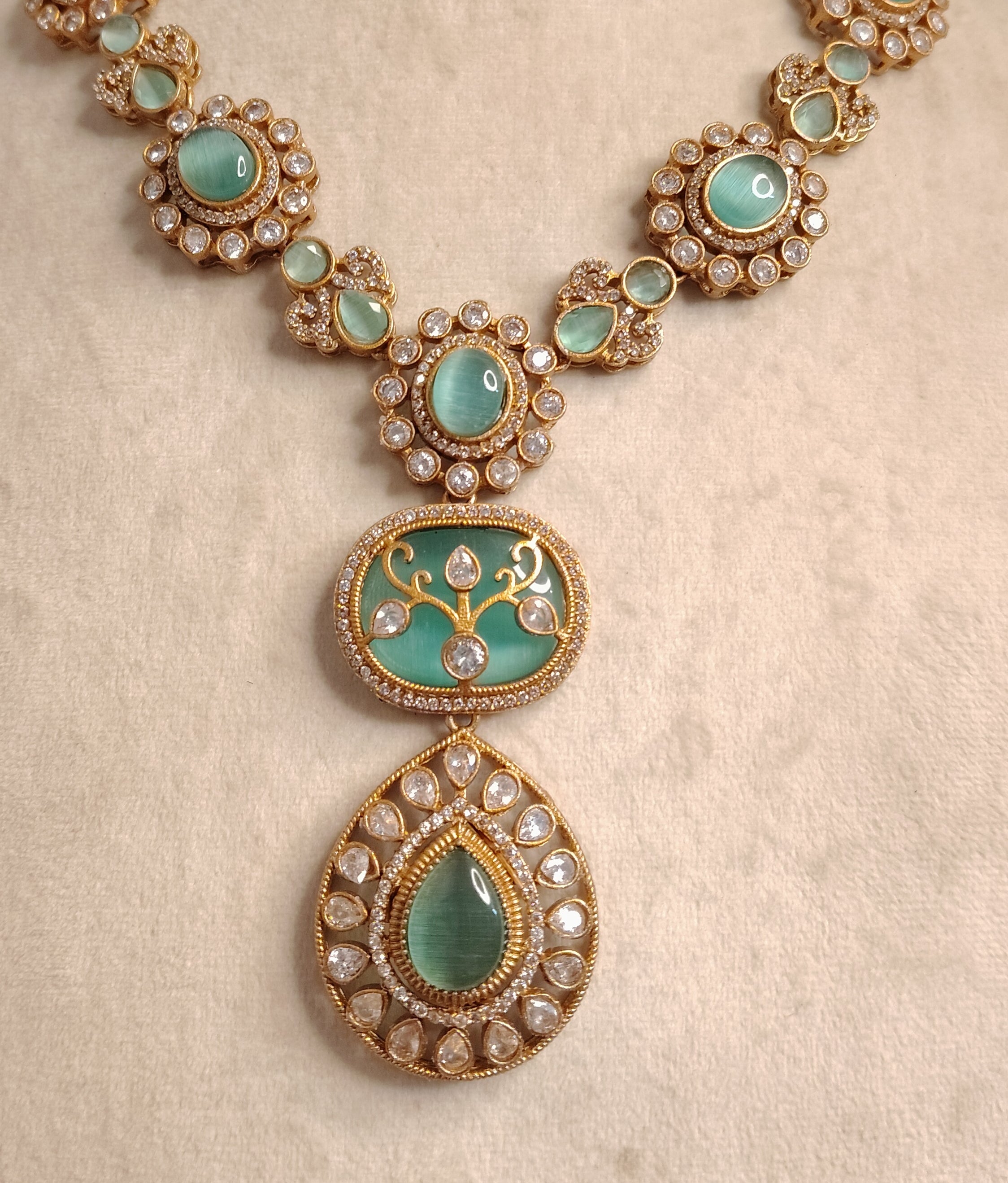 Hadiya Indian Mint Green Stone Necklace Set with Antique Gold Finish Roz Jewellers.