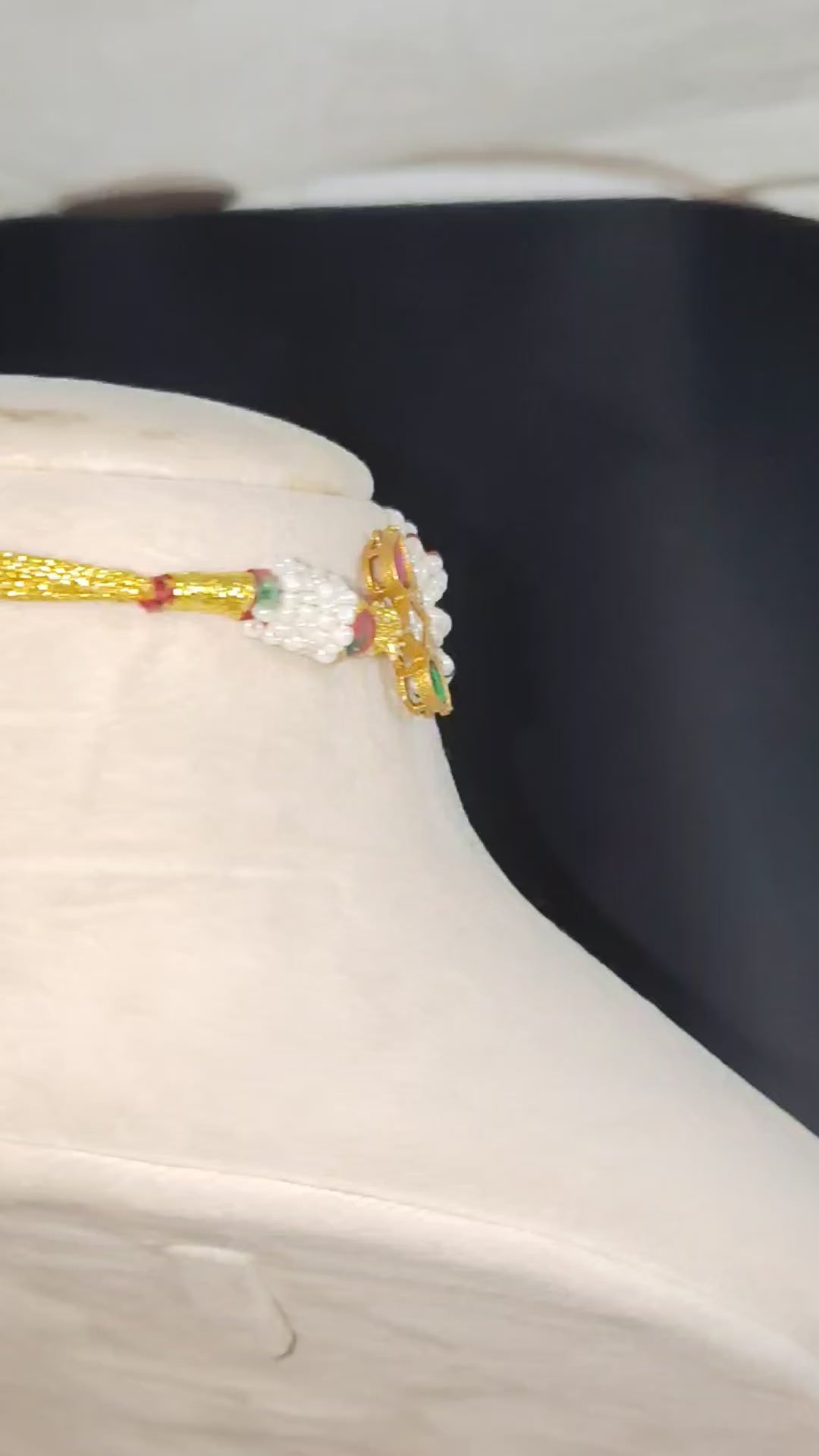 Dana Emerald Ruby Studded Multi Strand Pearl Kundan Choker Set Roz Jewellers.